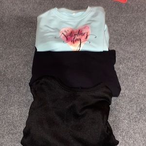 two black hoodies, one cropped black and one cropped Valentine’s Day hoddie